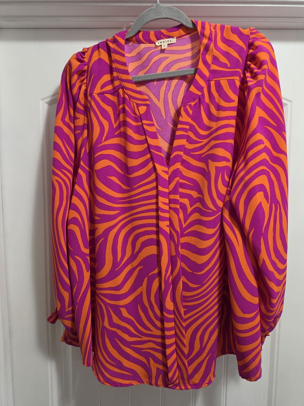 JODIFL Pink and Orange Zebra-Print V-Neck Blouse